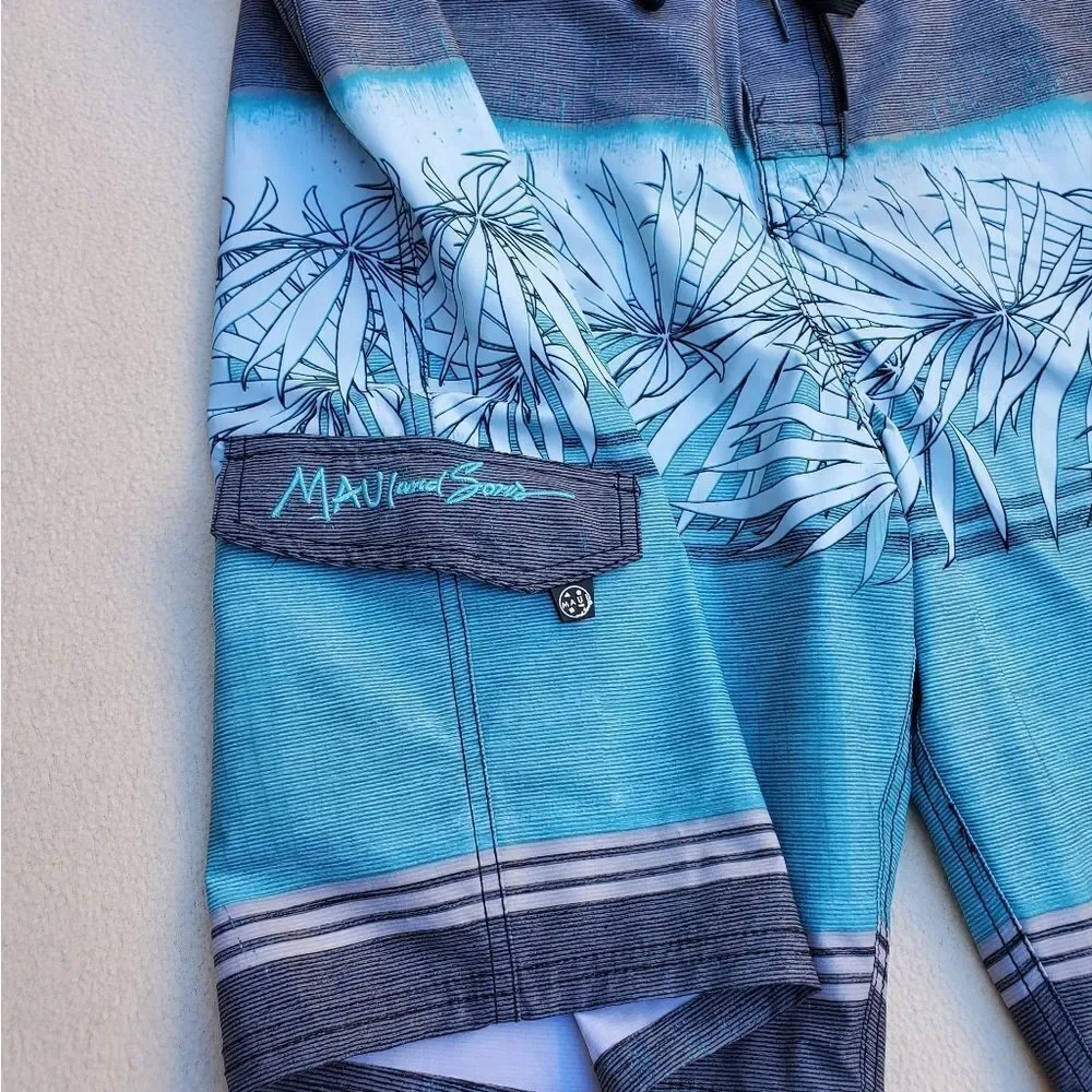 Maui and Sons blue gray and black board shorts